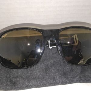 Maui Jim Red Sands polarized sunglasses with a black frame. 